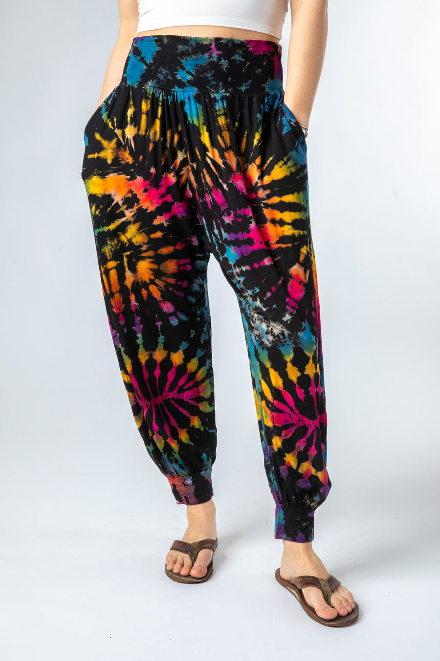 Sophie is wearing size S/M tie dye harem pants in black rainbow 