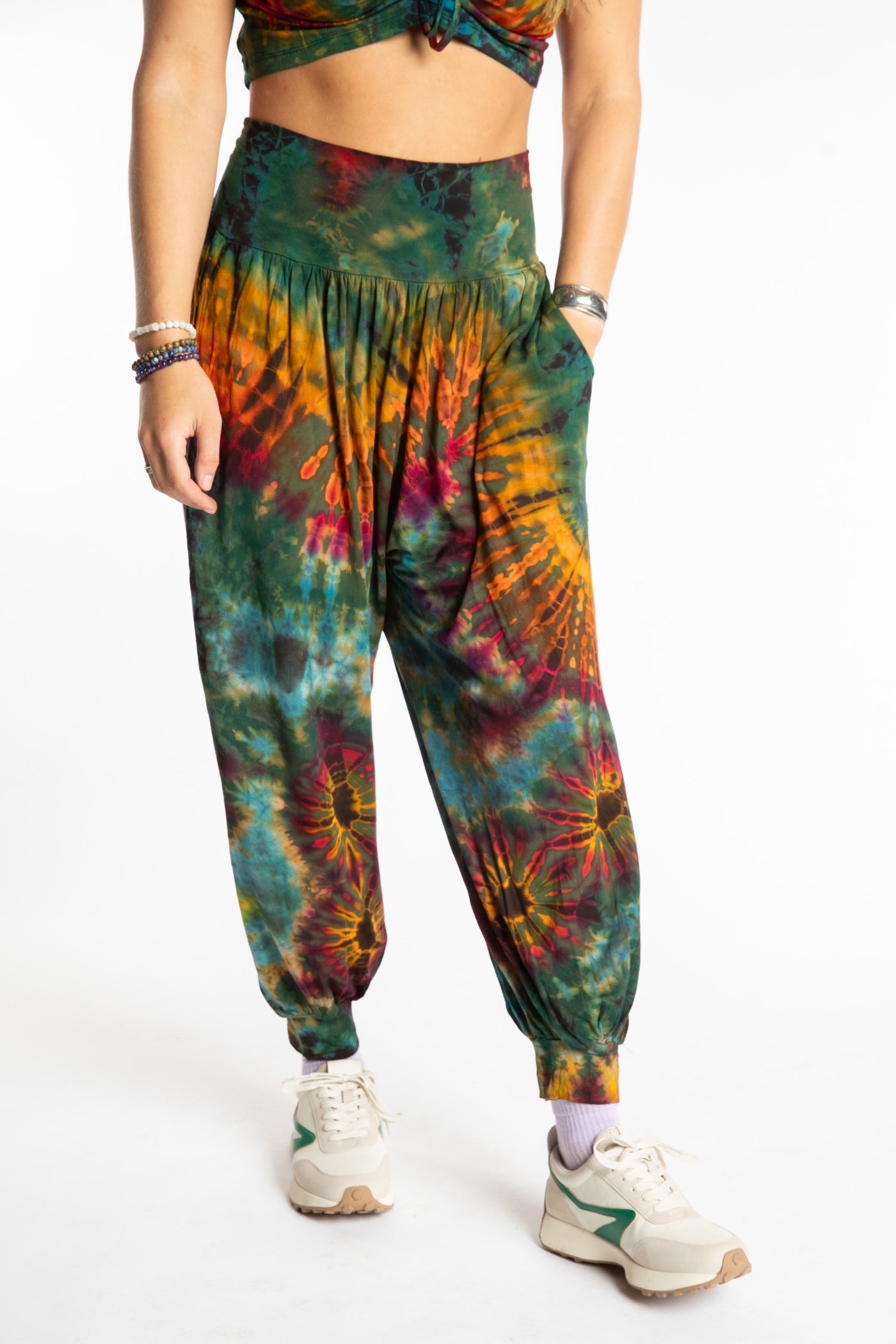 Sophie is wearing the S/M Jum Jum Tie Dye Harem Pants in Green