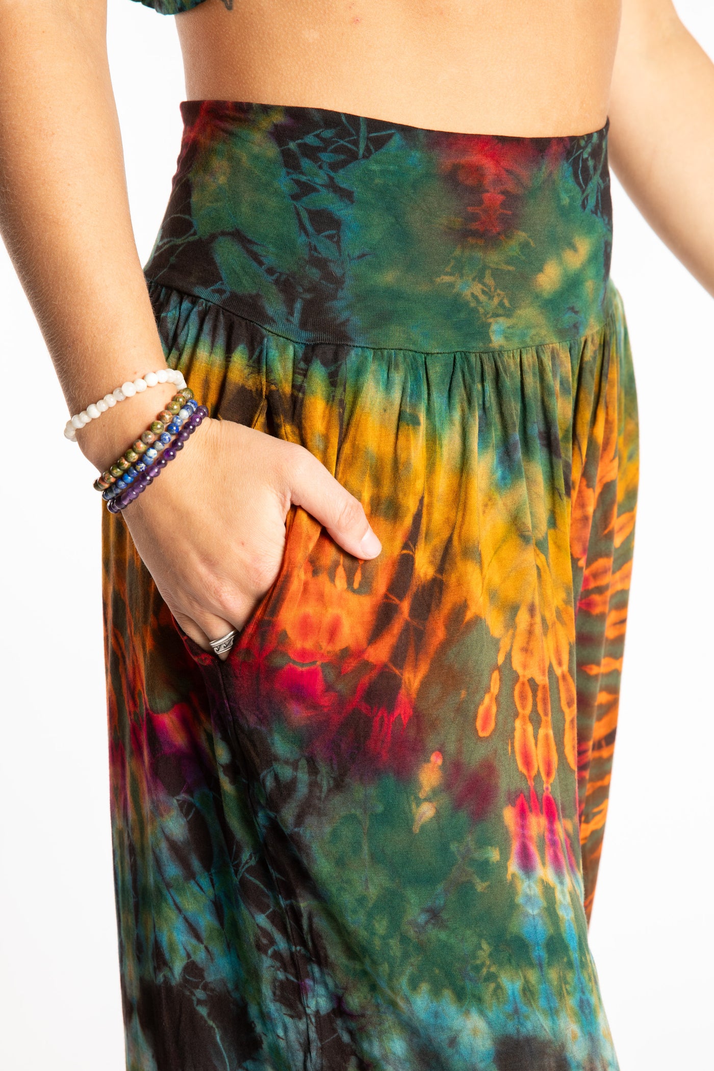 Sophie is wearing the S/M Jum Jum Tie Dye Harem Pants in Green