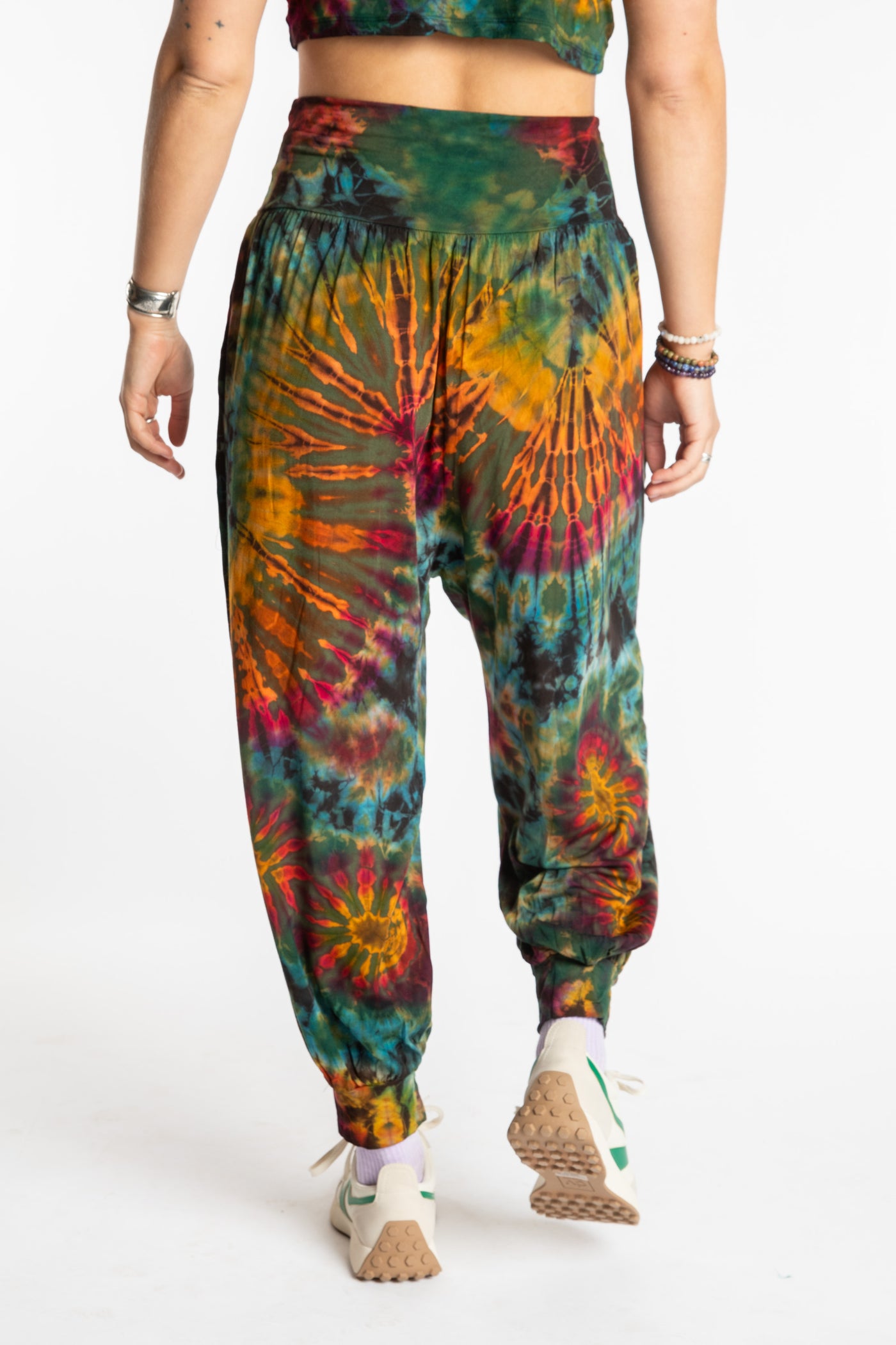 Sophie is wearing the S/M Jum Jum Tie Dye Harem Pants in Green