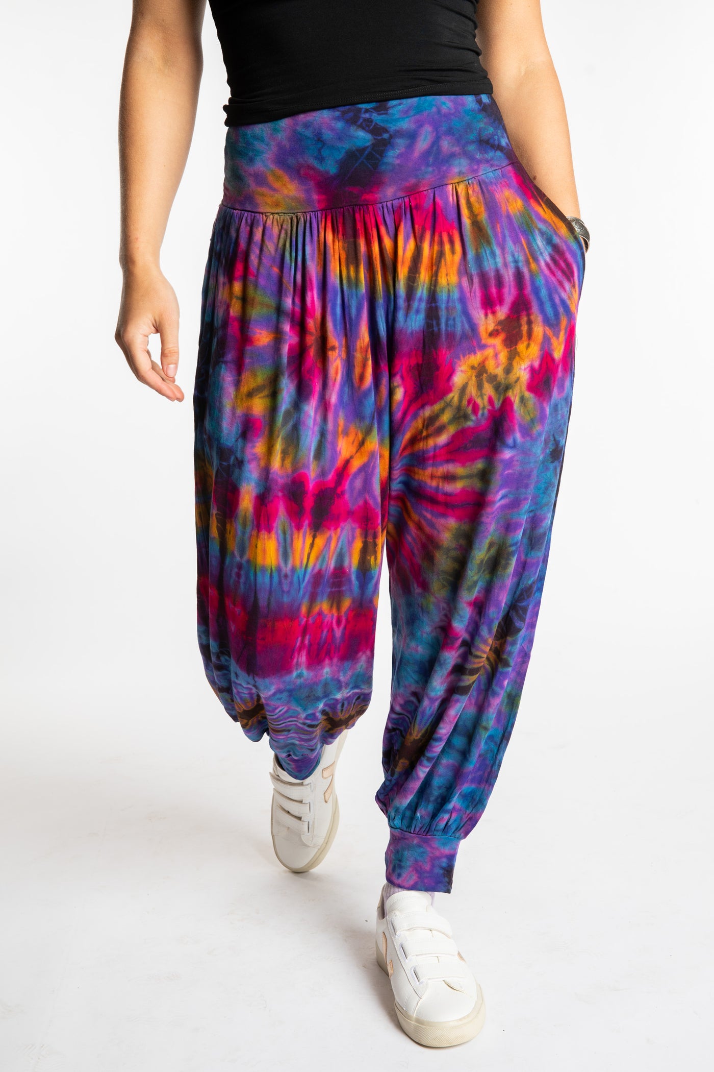 Sophie is wearing the S/M Jum Jum Tie Dye Harem Pants in Purple
