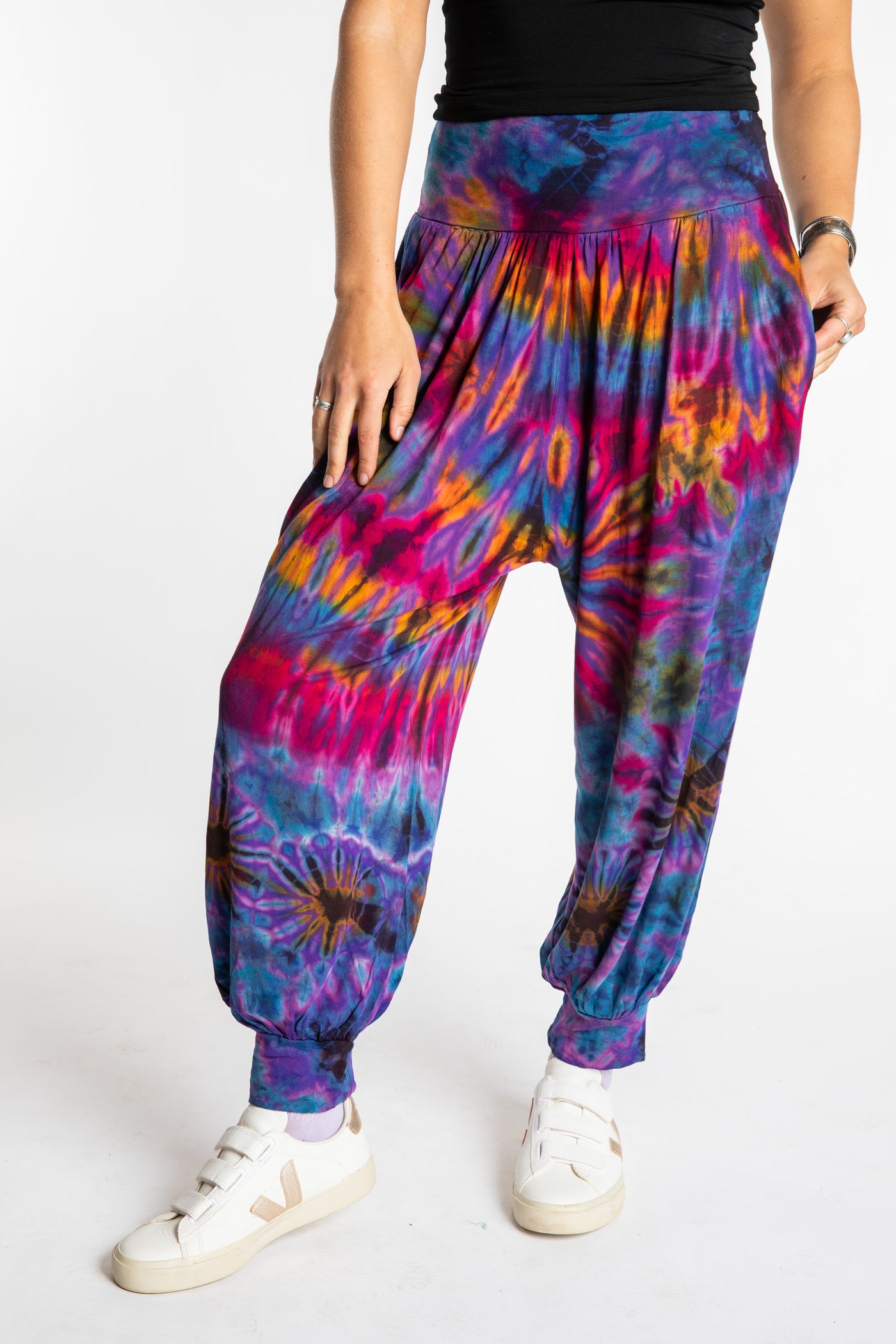 Sophie is wearing the S/M Jum Jum Tie Dye Harem Pants in Purple