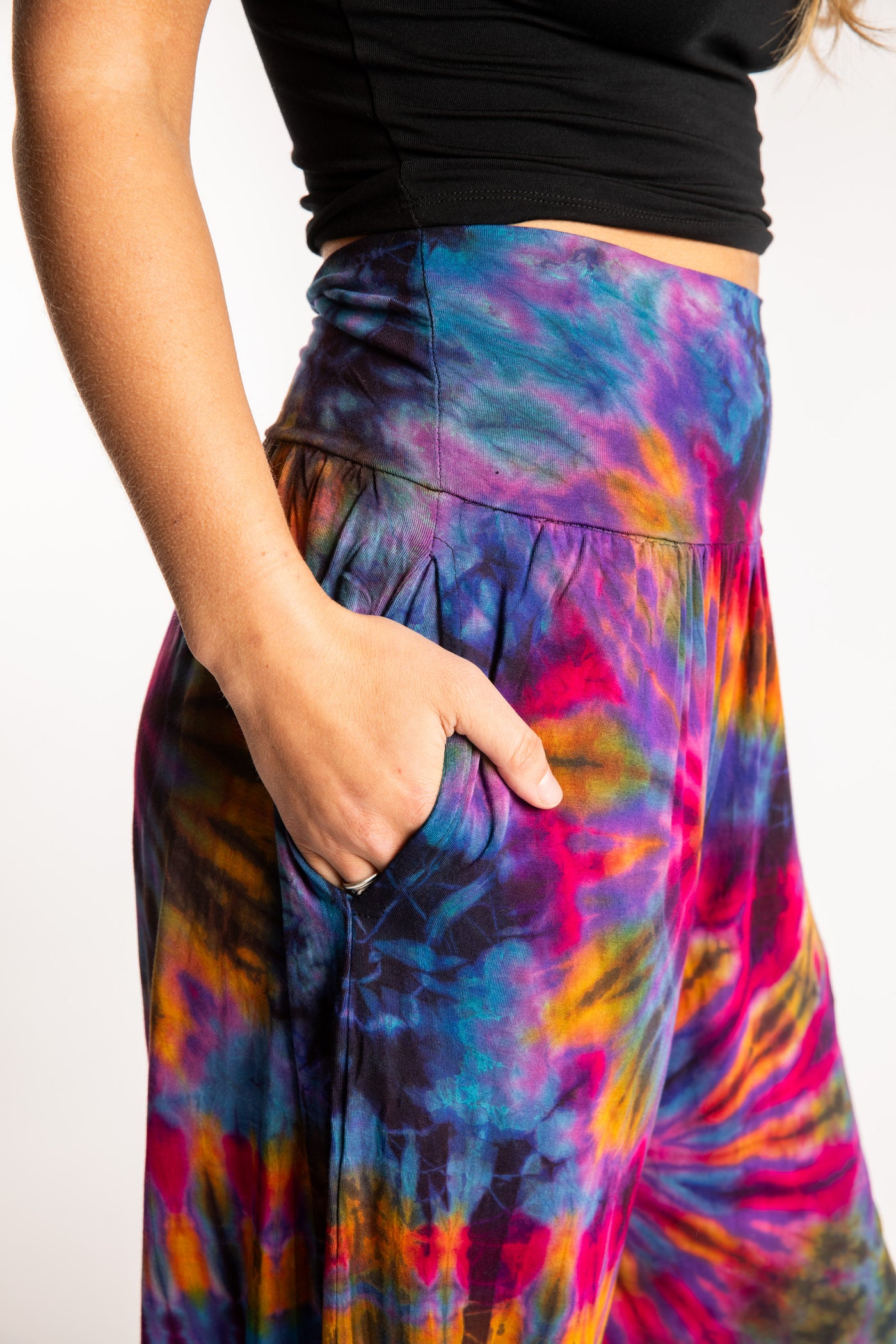 Sophie is wearing the S/M Jum Jum Tie Dye Harem Pants in Purple