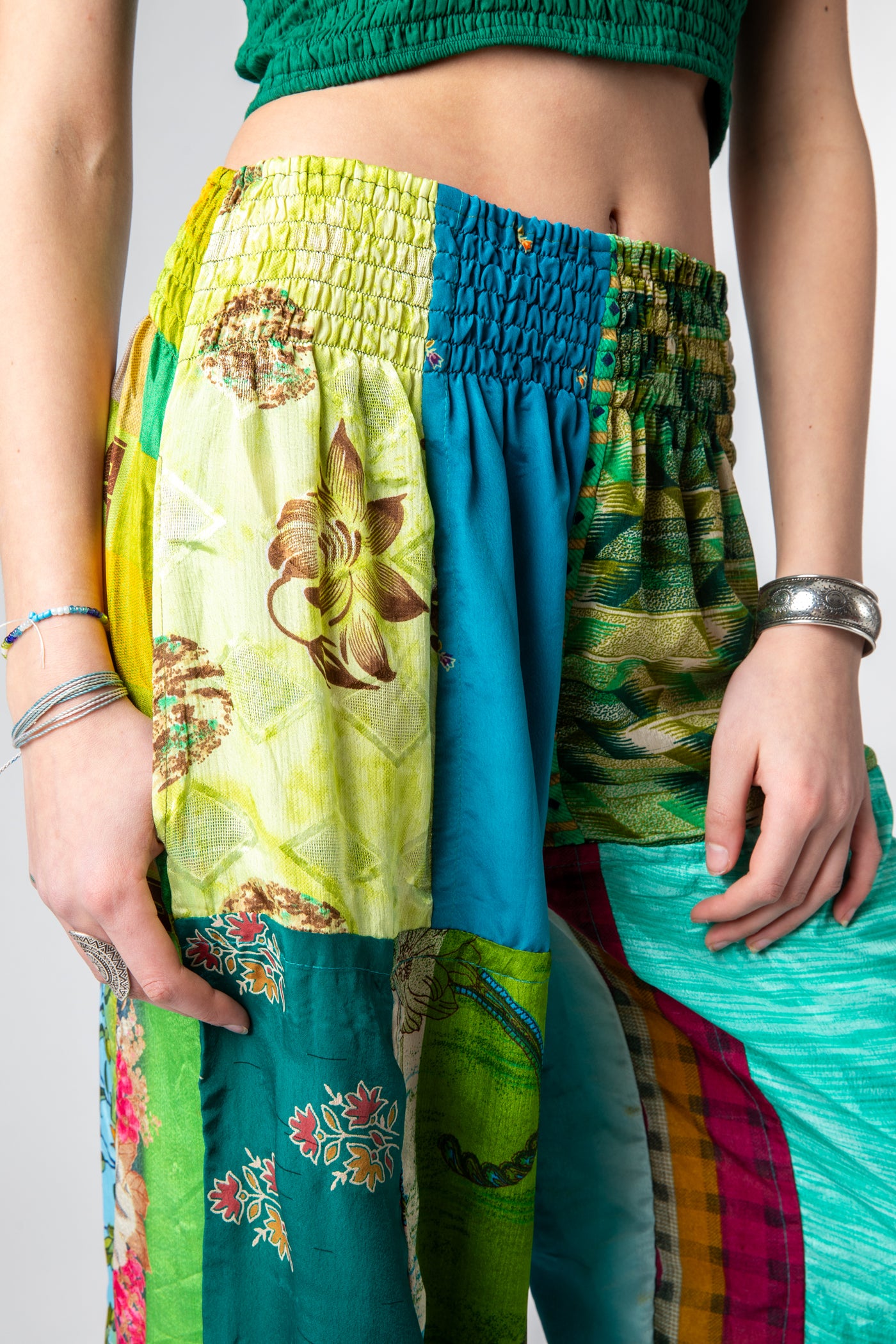 Sophie is wearing size S/M silk patchwork harem pants in morning dew