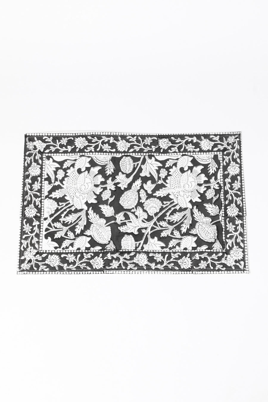 Block print placemat in monochrome grove