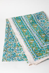 Bohemian block print tapestry in Blue Posie, folded on white background