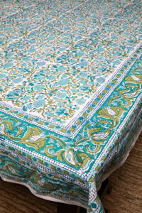 Bohemian block print tapestry in Blue Posie, displayed as a tablecloth