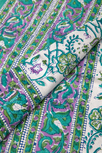 Bohemian block print tapestry in Drifting Blossoms, folded on white background