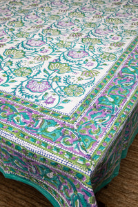 Bohemian block print tapestry in Drifting Blossoms, displayed as tablecloth