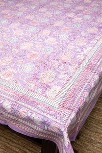 Bohemian block print tapestry in Lavender Floral, displayed as a tablecloth