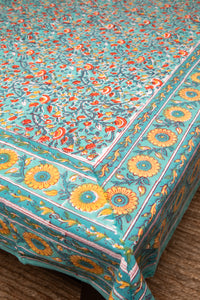 Bohemian block print tapestry in Mediterranean Oasis, displayed as a tablecloth