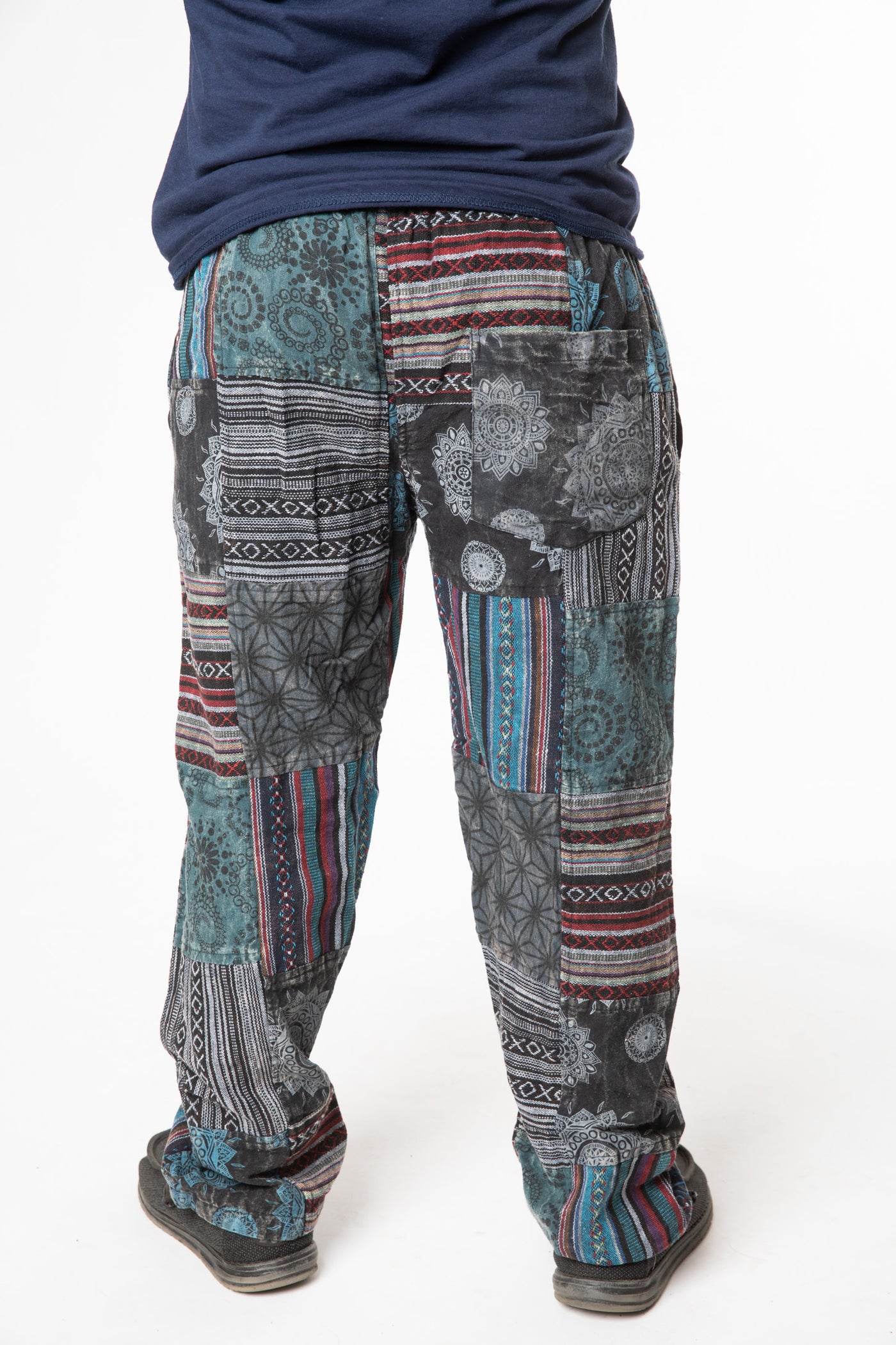 Harvey is wearing size M patchwork pants in black 