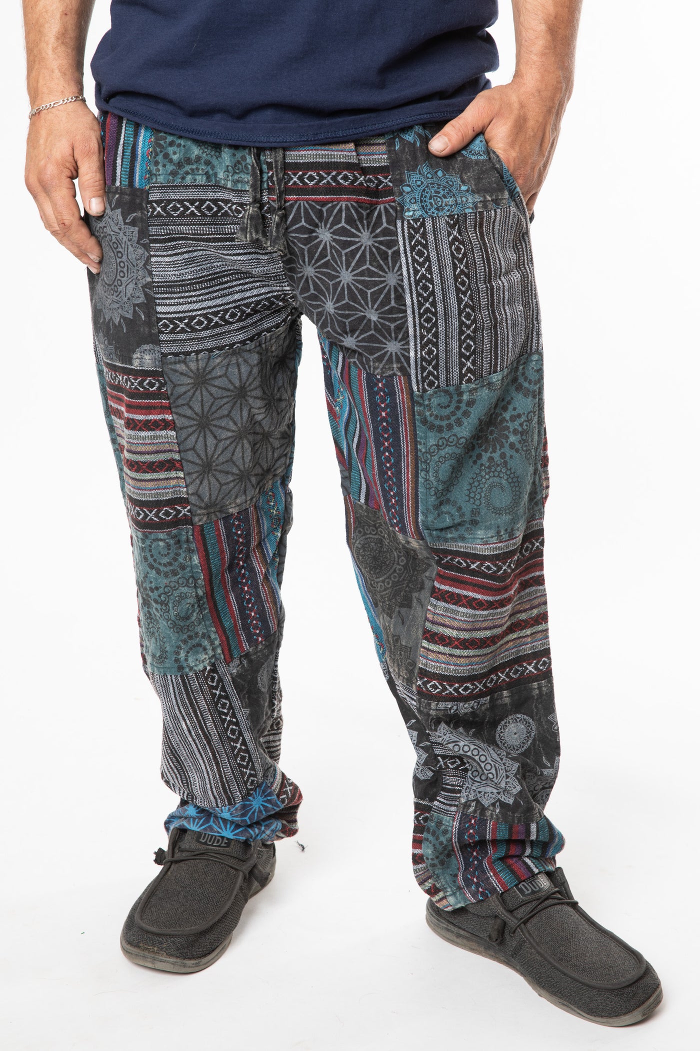 Harvey is wearing size M patchwork pants in black 