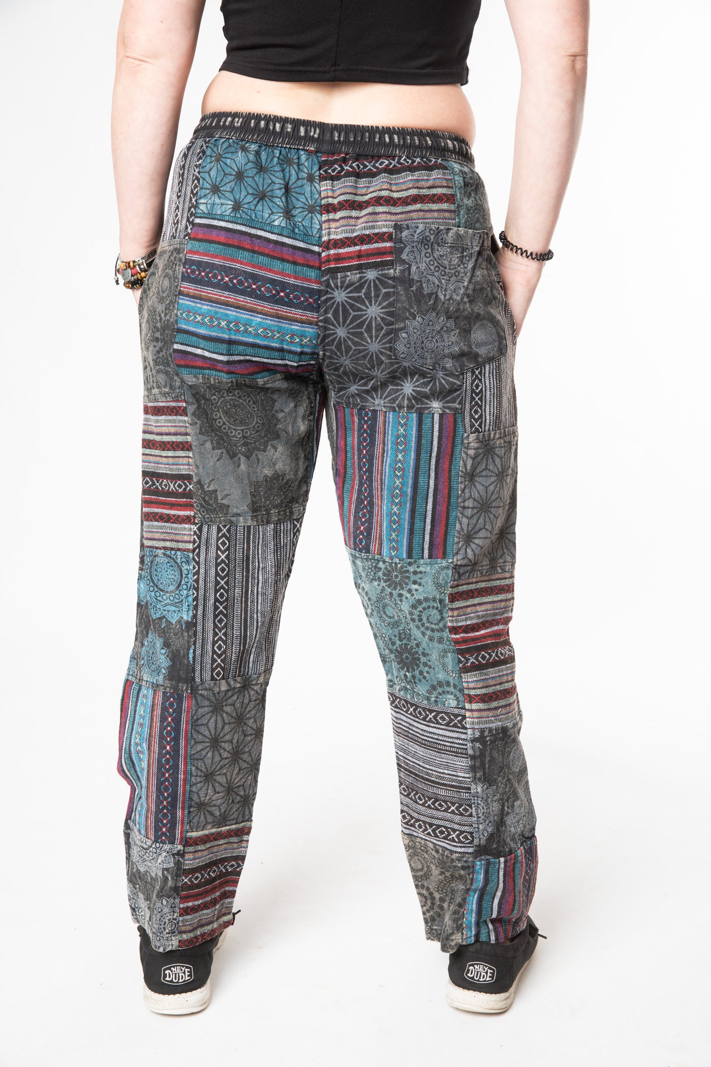 Margaret is wearing size M patchwork pants in black 