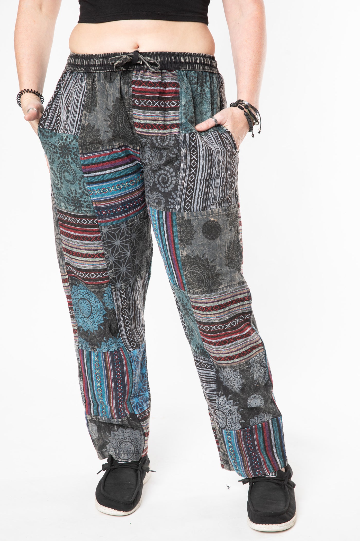 Margaret is wearing size M patchwork pants in black 