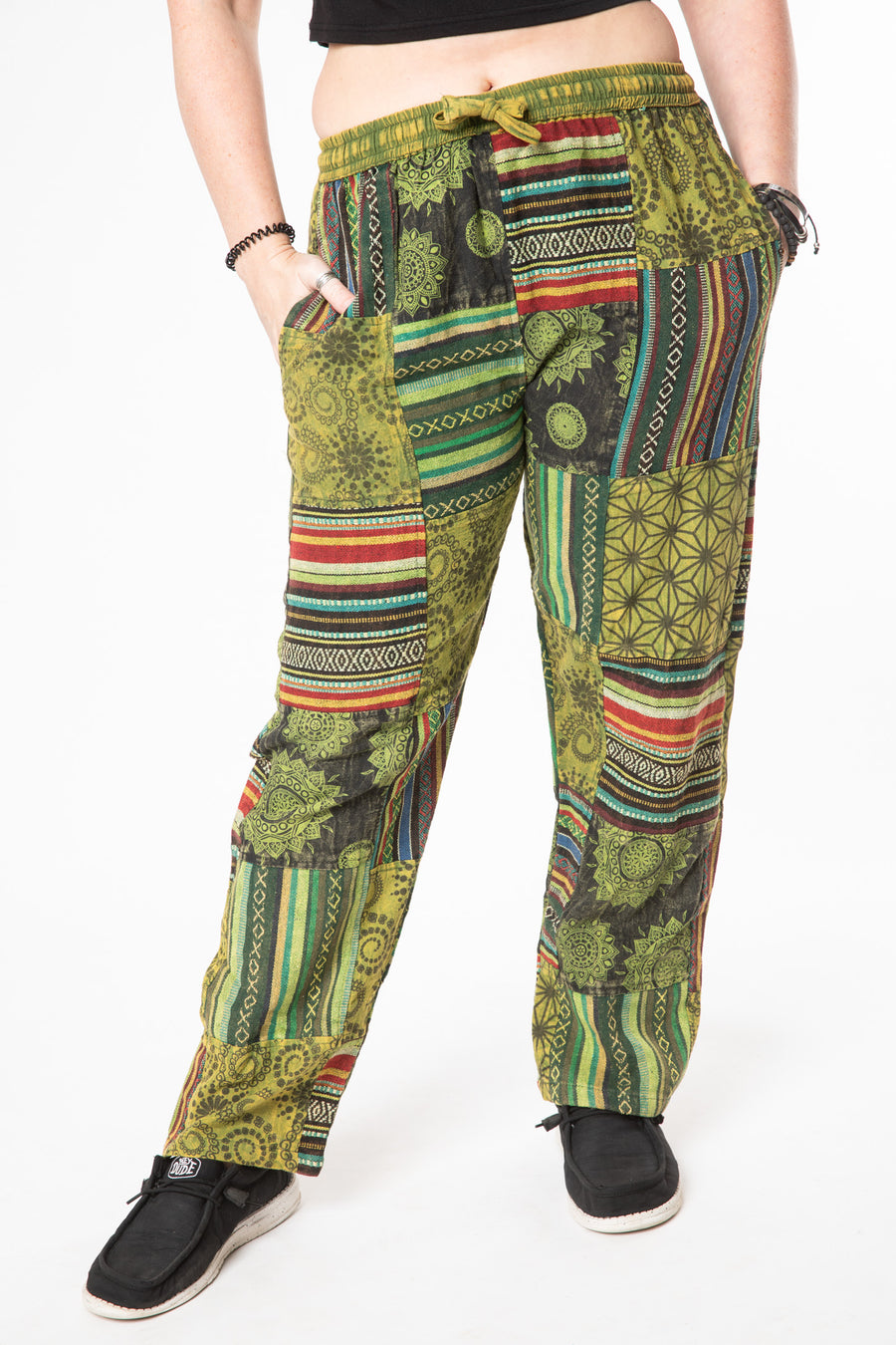 Margaret is wearing size M patchwork pants in green 