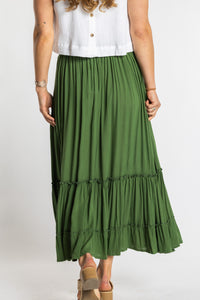 Sophie is wearing the Breezy Bliss Boho Prairie Skirt in green Fern