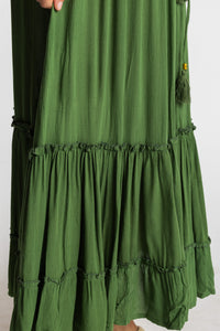 Sophie is wearing the Breezy Bliss Boho Prairie Skirt in green Fern