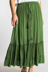 Sophie is wearing the Breezy Bliss Boho Prairie Skirt in green Fern