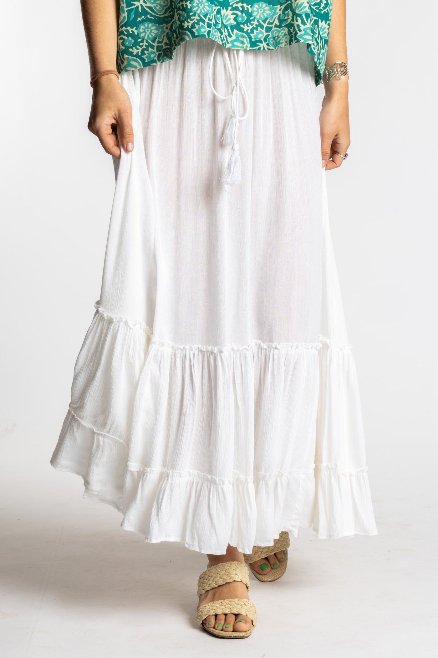 Sophie is wearing the Breezy Bliss Boho Prairie Skirt in white ivory