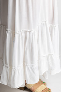 Sophie is wearing the Breezy Bliss Boho Prairie Skirt in white ivory