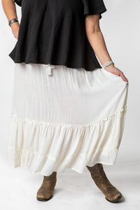 Betty is wearing the Breezy Bliss Boho Prairie Skirt in white ivory