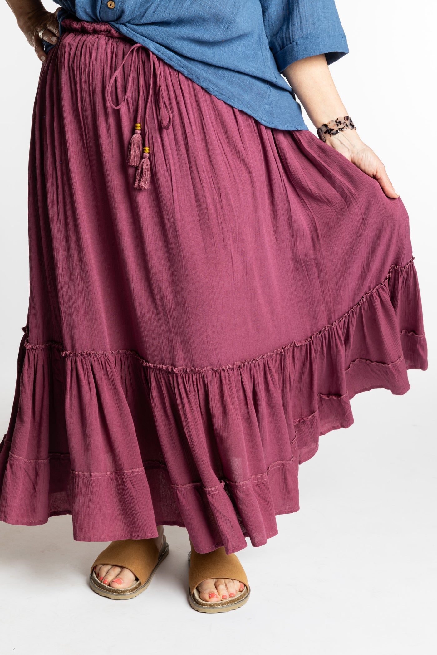 Betty is wearing the Breezy Bliss Boho Prairie Skirt in Lilac