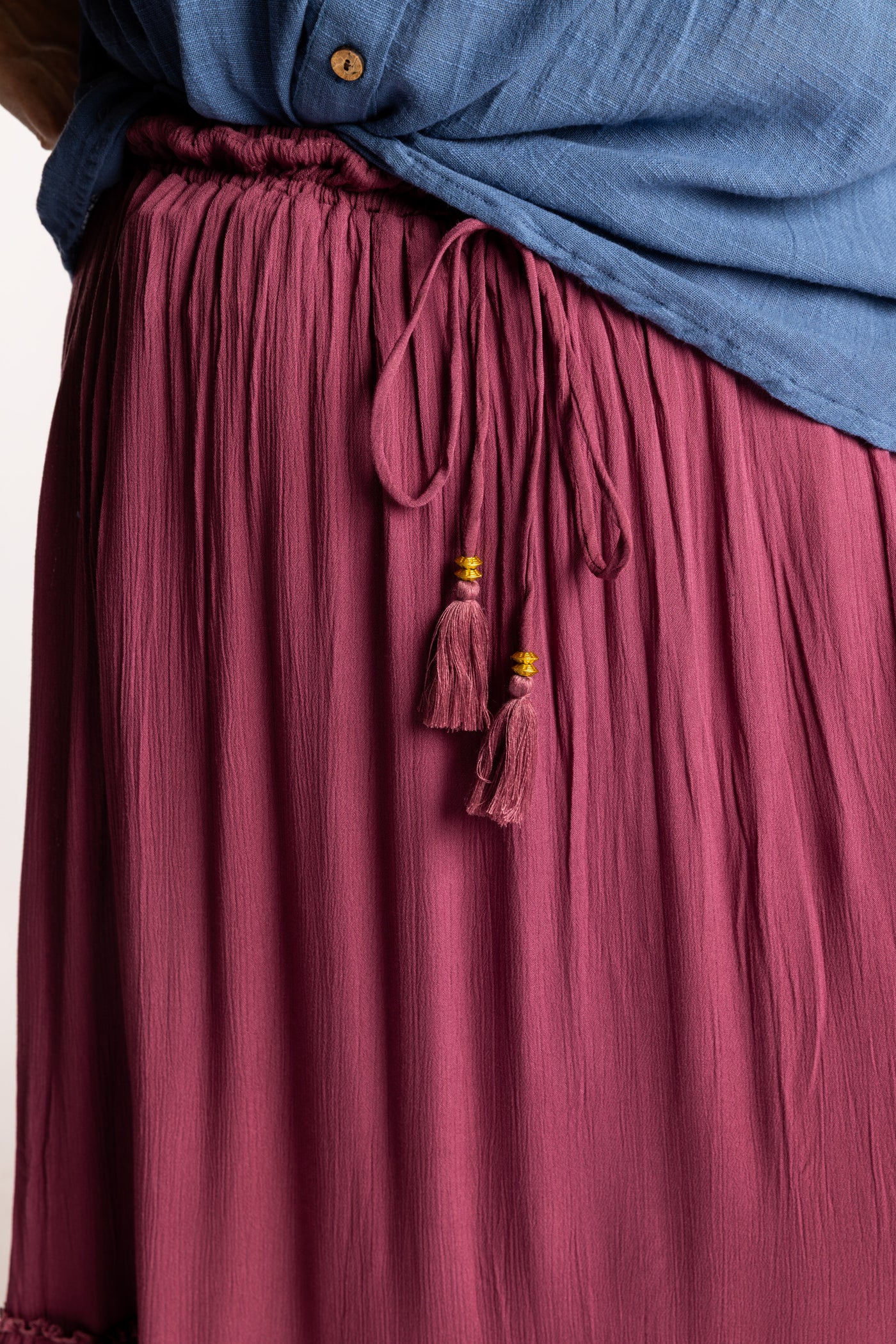 Betty is wearing the Breezy Bliss Boho Prairie Skirt in Lilac