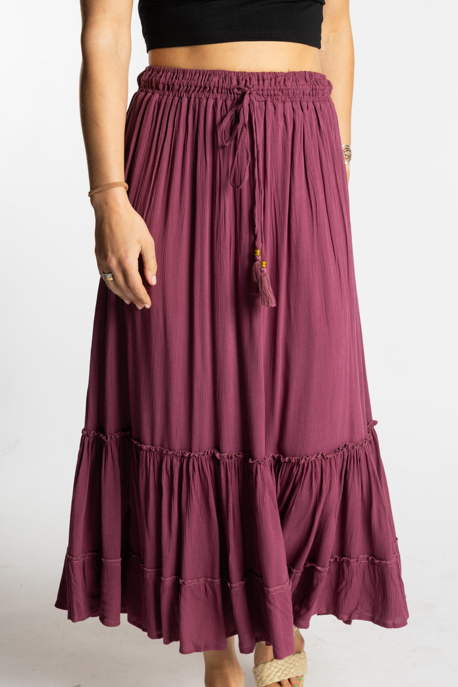 Sophie is wearing the Breezy Bliss Boho Prairie Skirt in Lilac