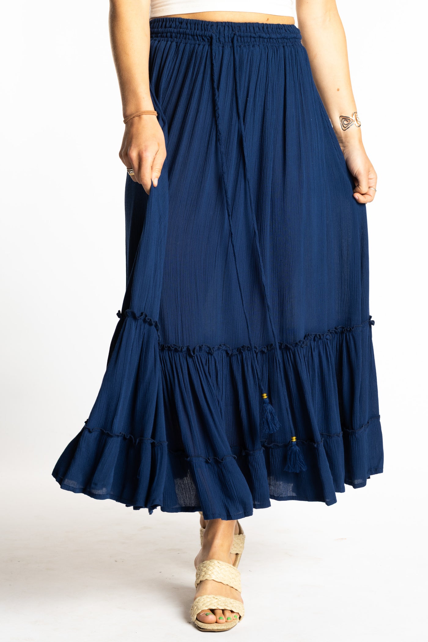 Sophie is wearing the Breezy Bliss Boho Prairie Skirt in blue navy