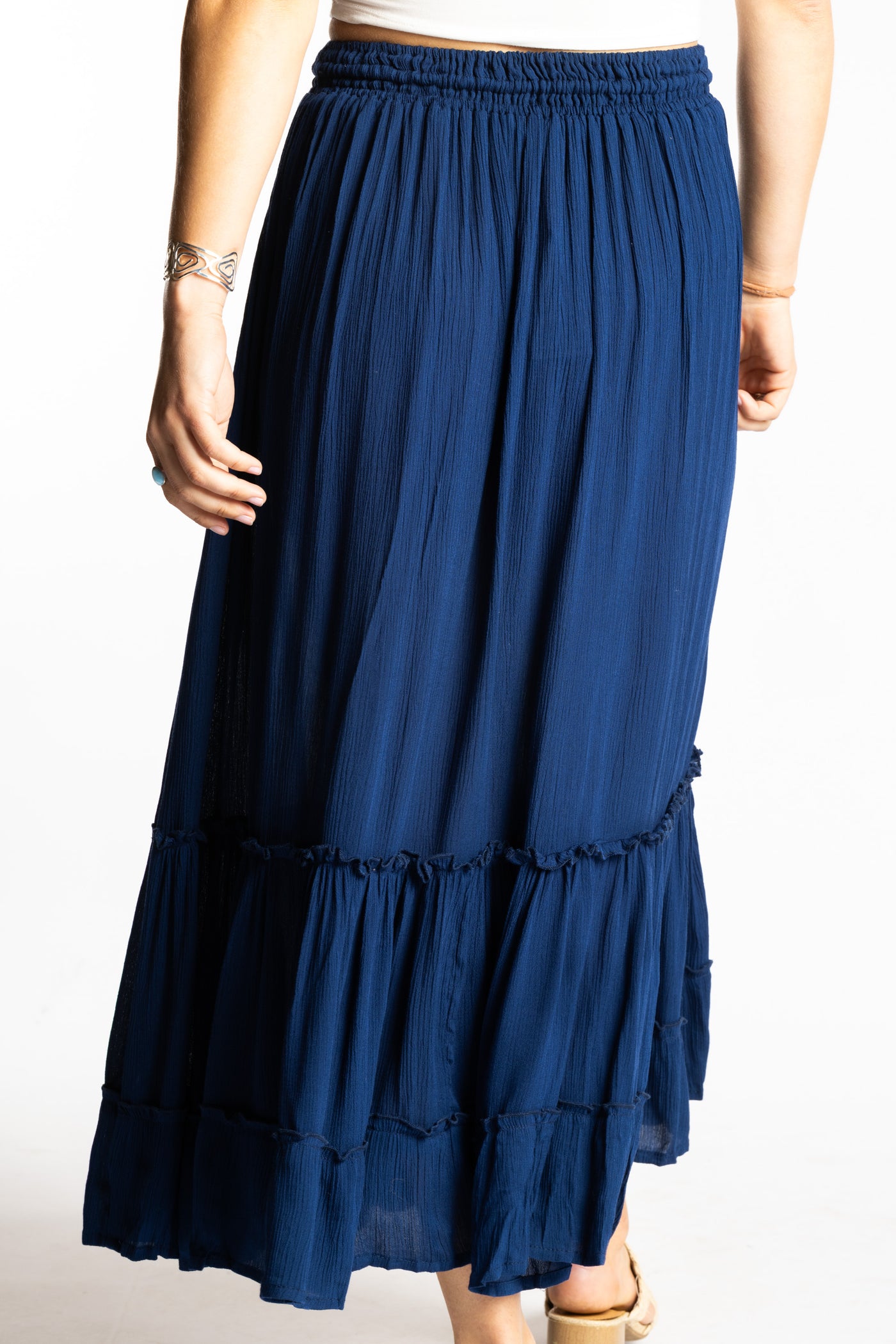 Sophie is wearing the Breezy Bliss Boho Prairie Skirt in blue navy
