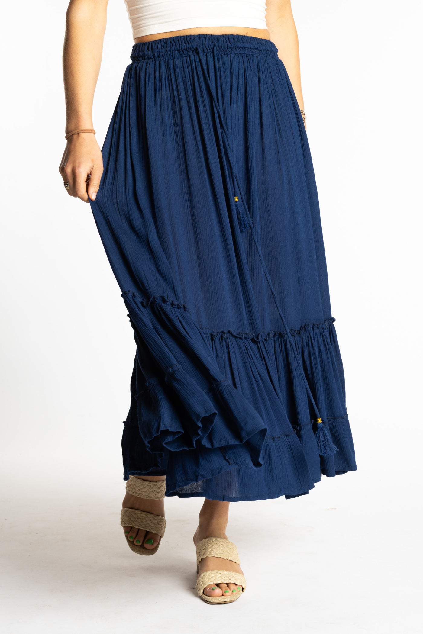 Sophie is wearing the Breezy Bliss Boho Prairie Skirt in blue navy