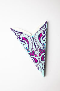 Lavender embroidered paper star folded up, out of the package