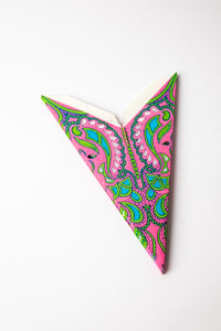 Pink and Green embroidered paper star folded up, out of the package