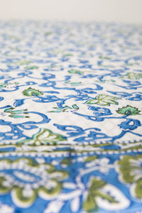 Round block print tablecloth in blue and green vines