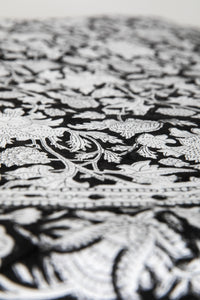 Round block print tablecloth in monochrome grove