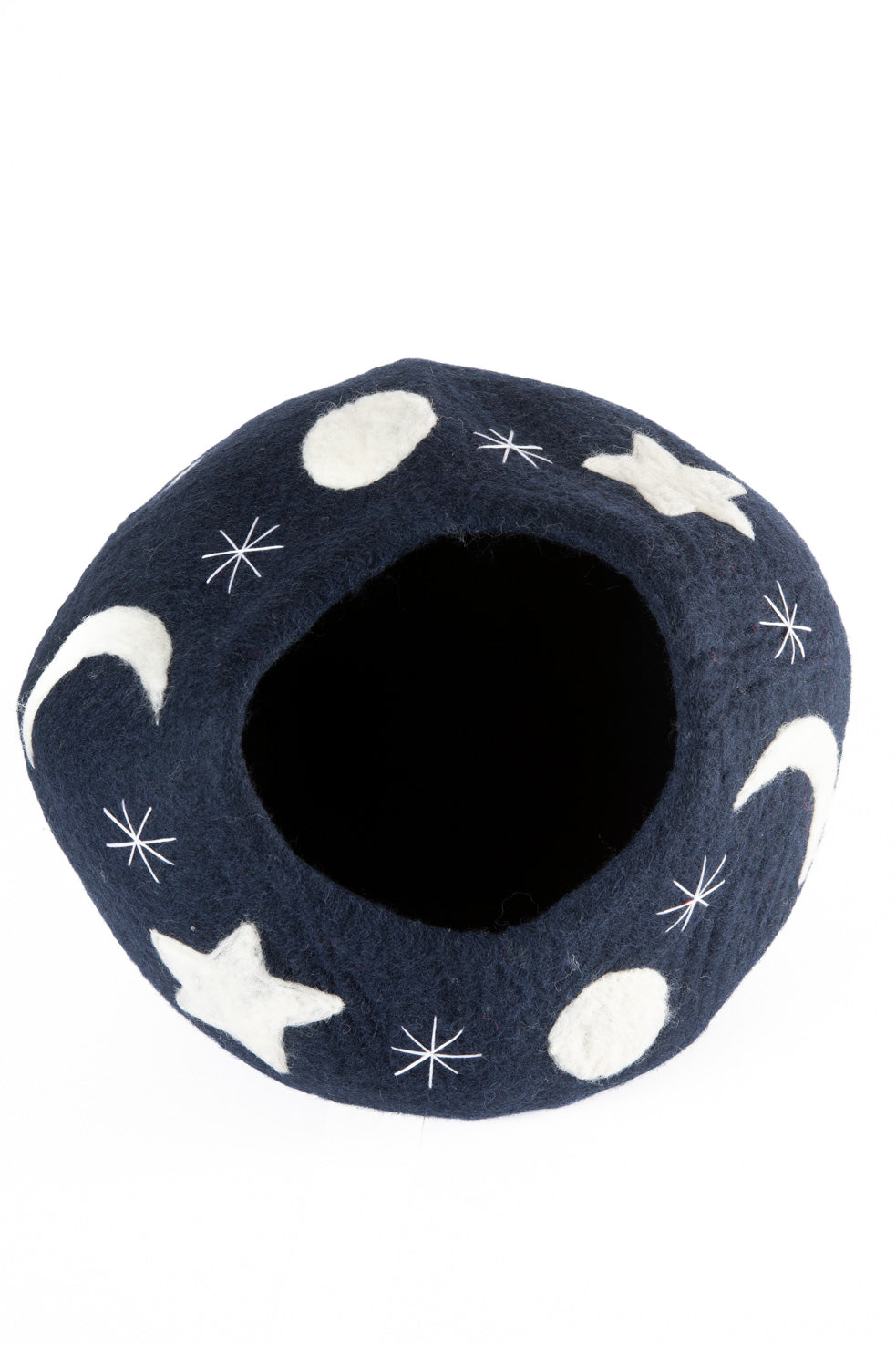 A navy felted cat cave with star and moon  deisgns