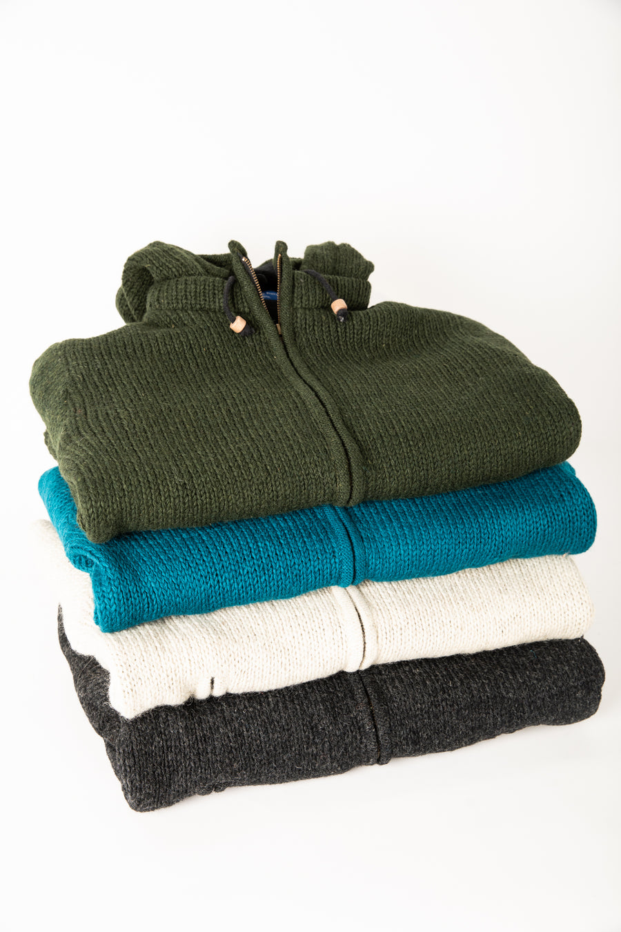 stack of wool hooded jackets to show off the different color possibilities