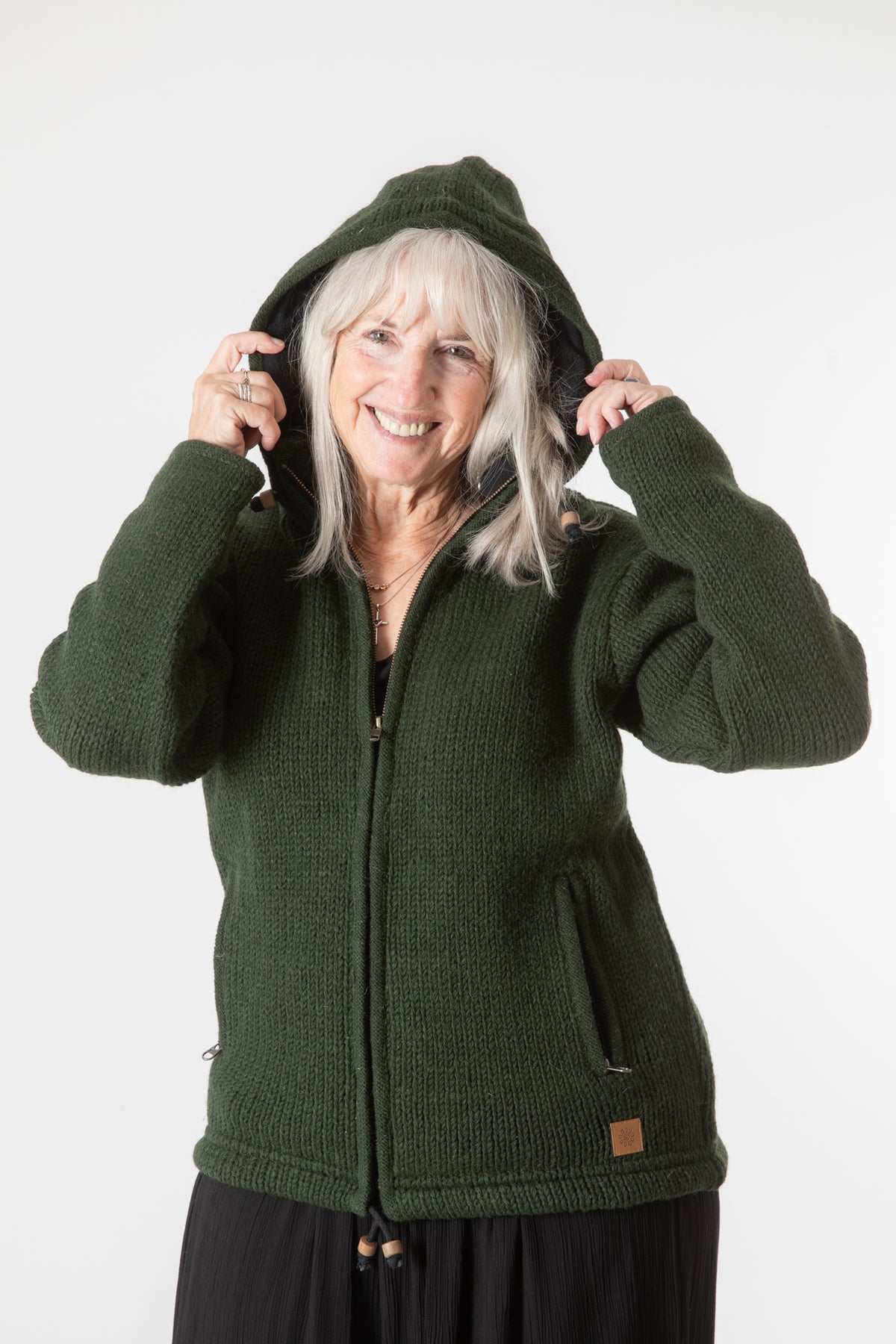 Toni wearing size S Olive wool hoodie jacket