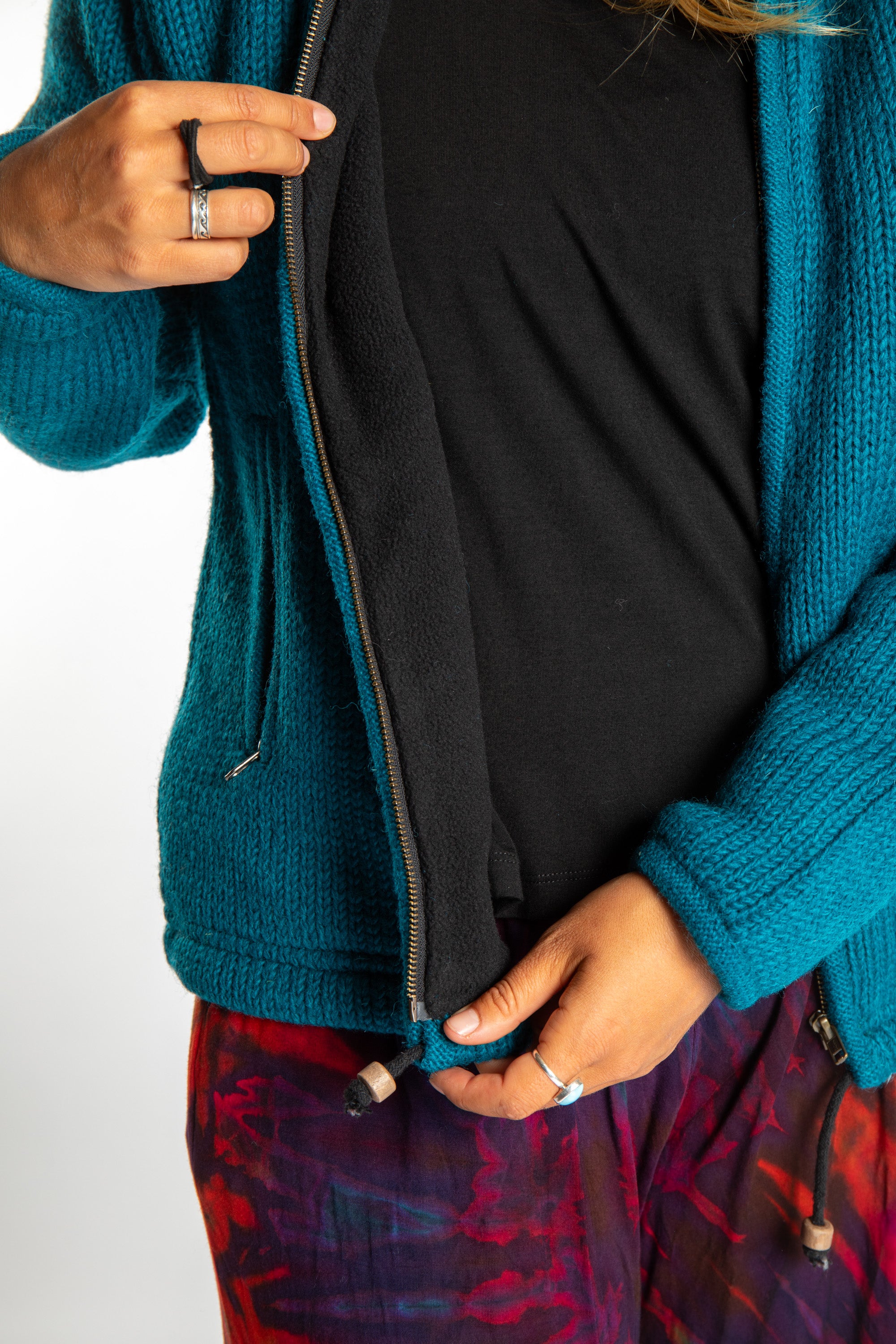 Detail of zipper on Teal wool hoodie jacket