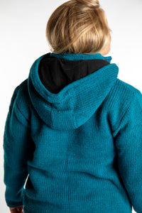 Sophie wearing size S Teal wool hoodie jacket