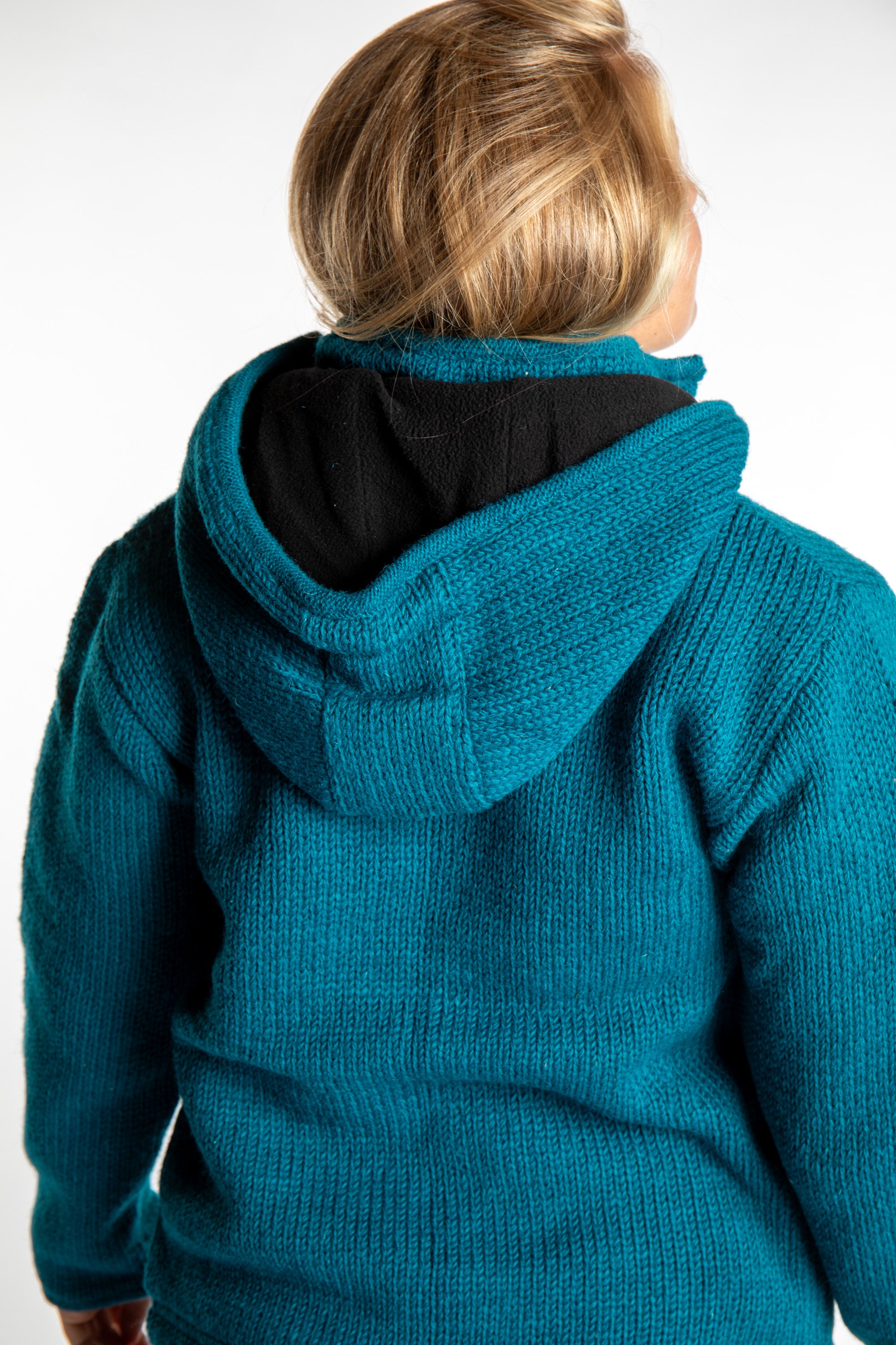 Sophie wearing size S Teal wool hoodie jacket