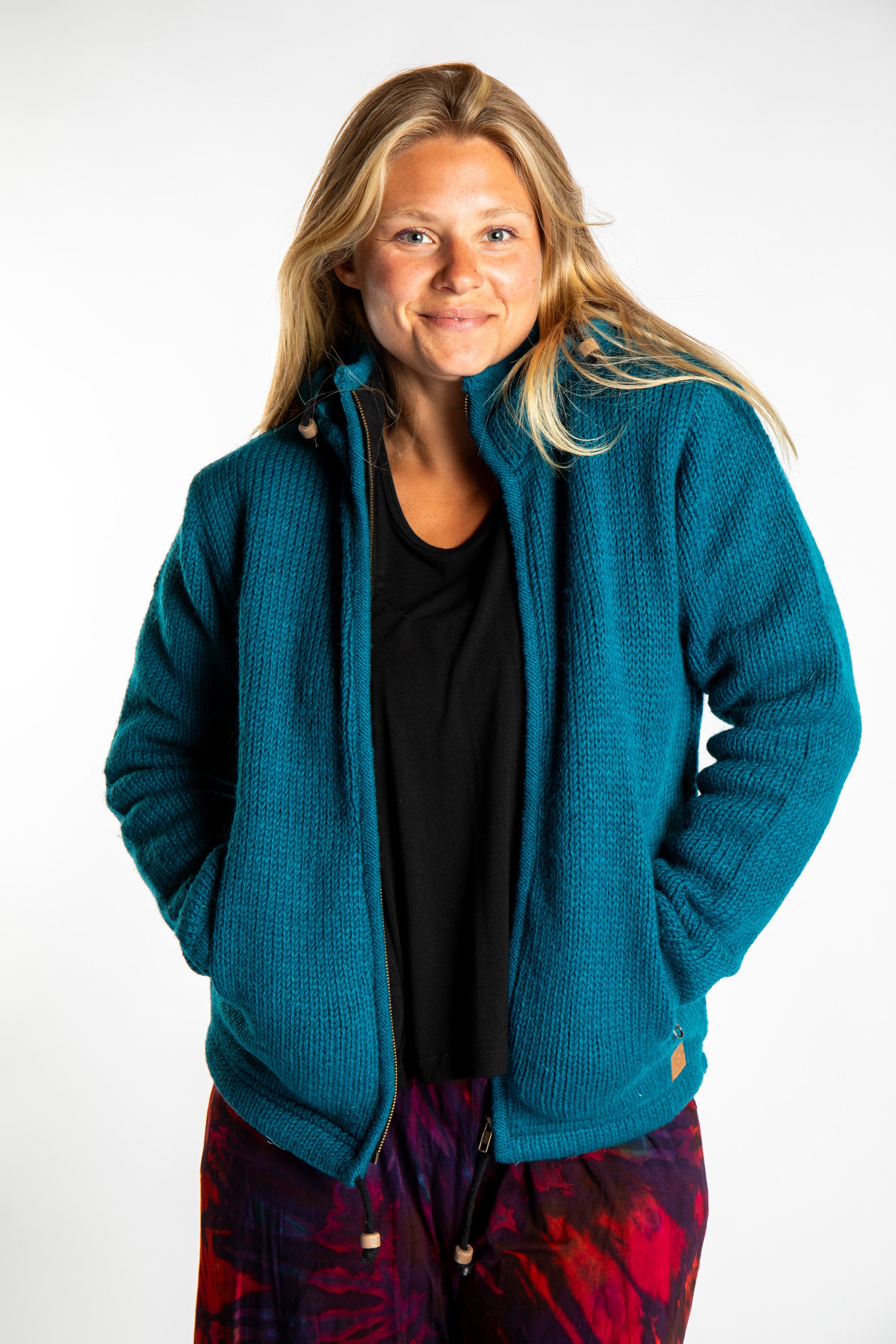 Toni wearing size S Teal wool hoodie jacket