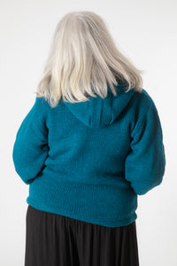Toni wearing size S Teal Wool hoodie jacket