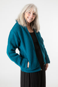 Toni wearing size S Teal Wool hoodie jacket