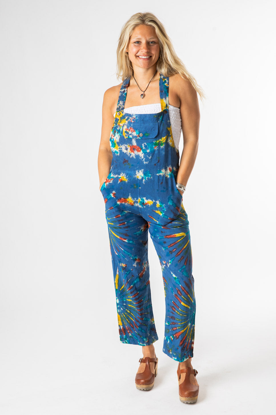 Sophie is wearing size S tie dye overalls in blue