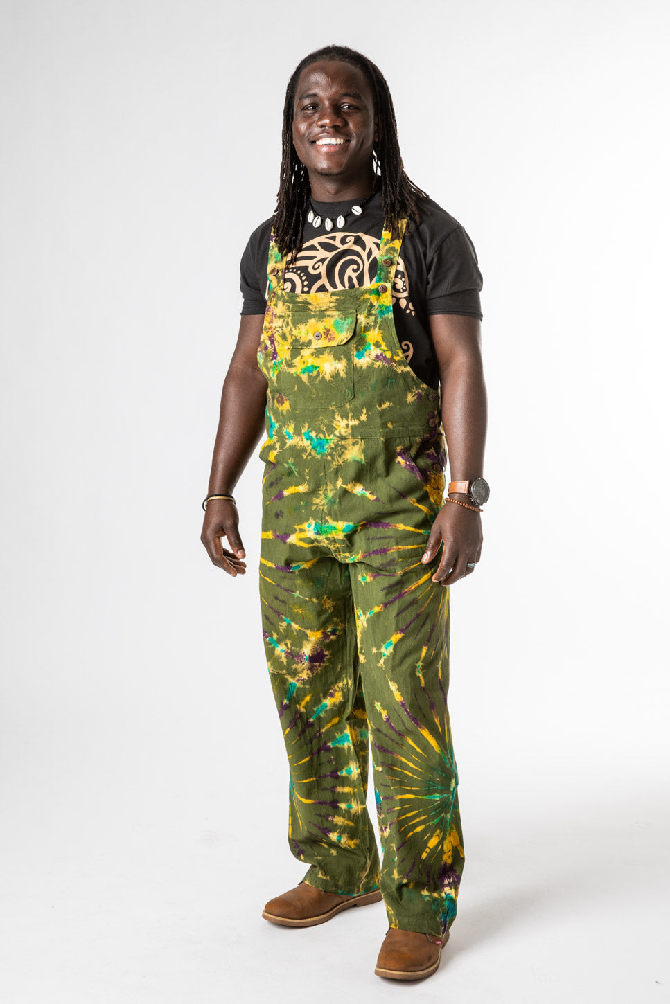 DJ is wearing size M tie dye overalls in green
