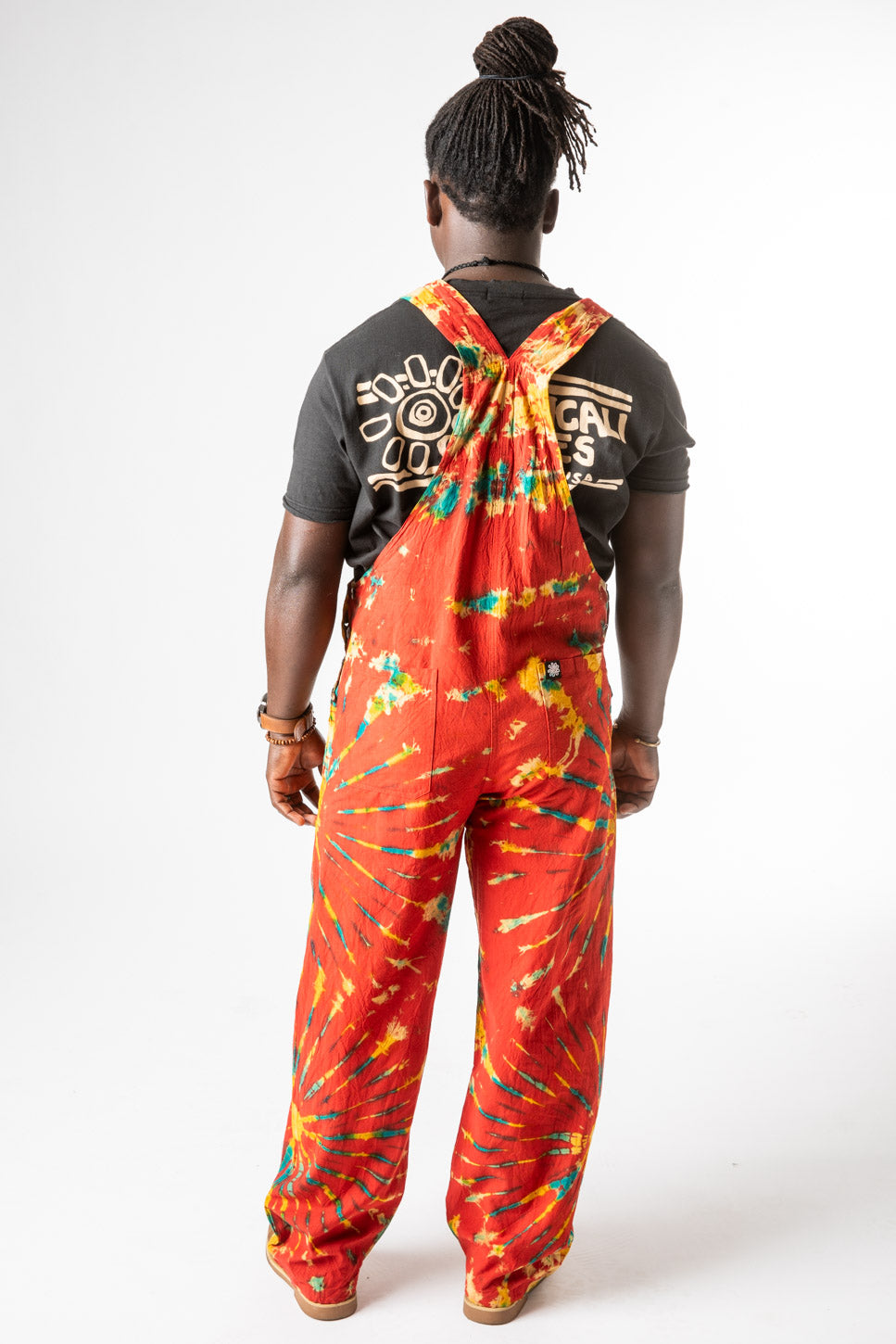 DJ is wearing size M tie dye overalls in red