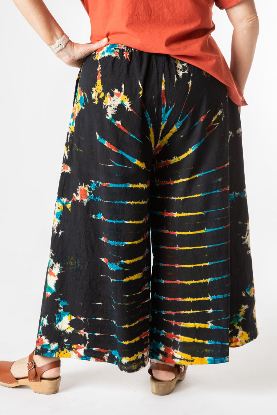 Betty is wearing size S/M tie dye palazzo pants in black