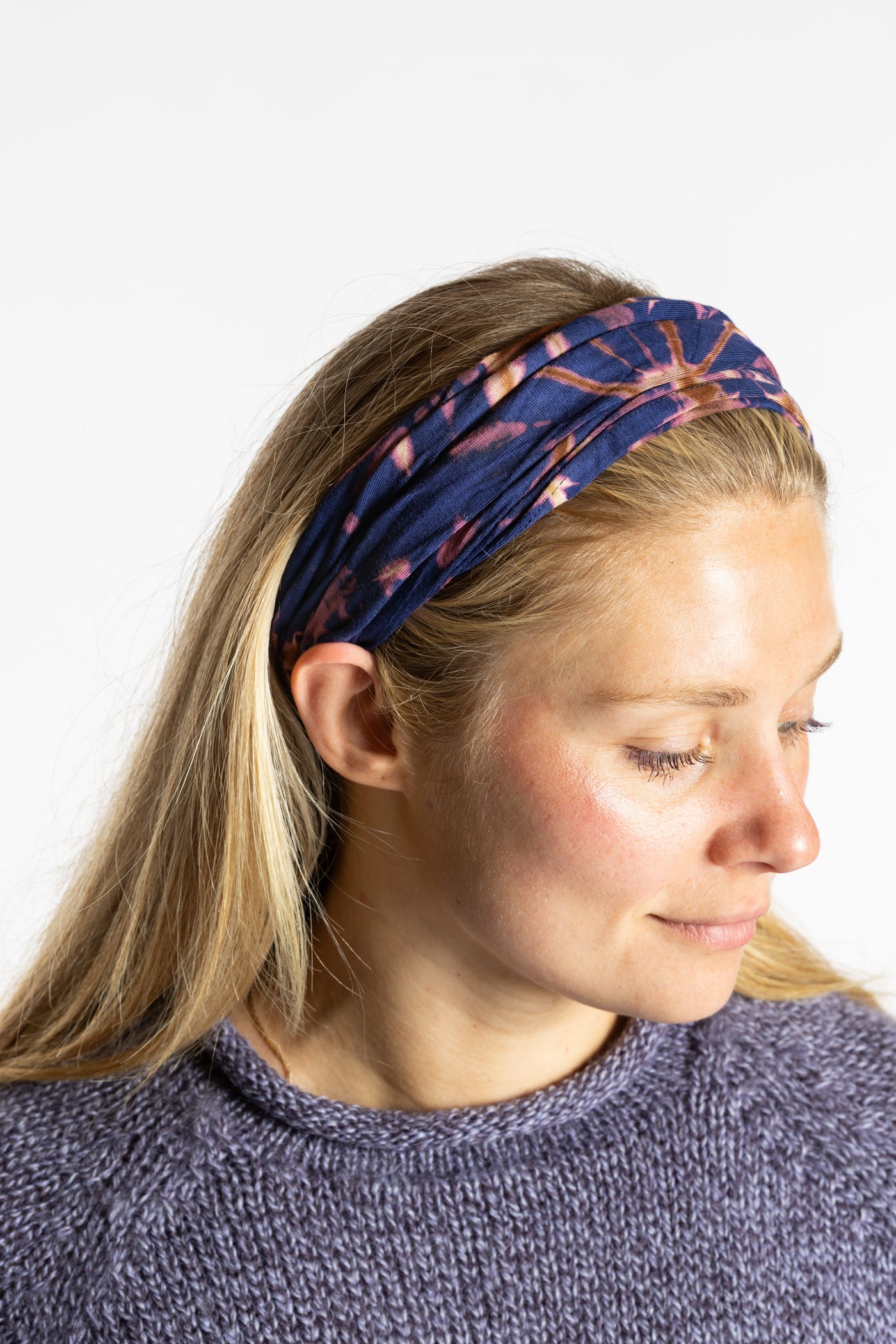 Sophie is wearing the Soeng Tie Dye Headband in Navy